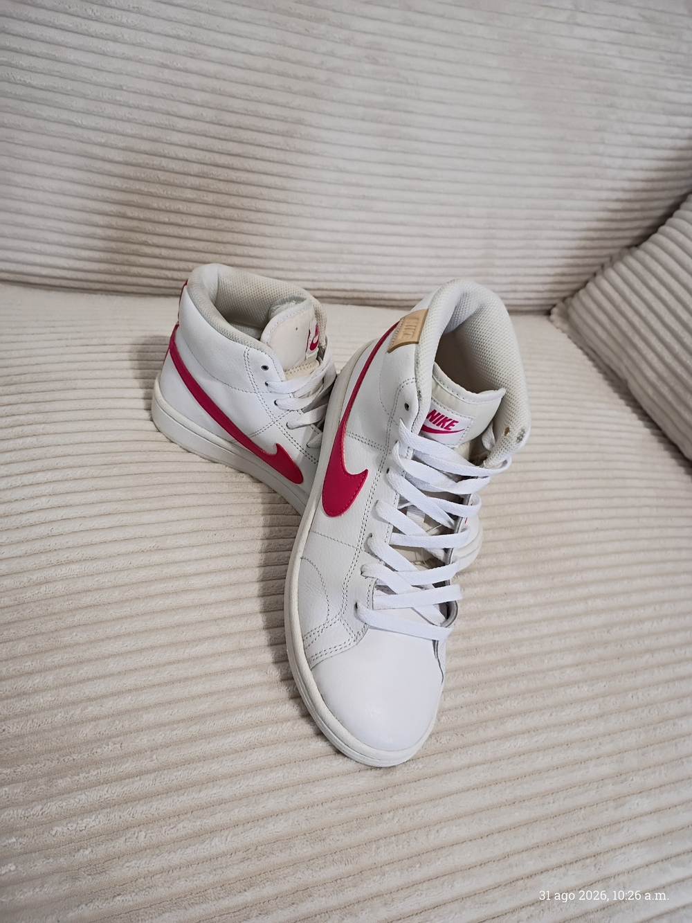 Nike Women’s White High-Top Sneakers with Pink Swoosh Accents